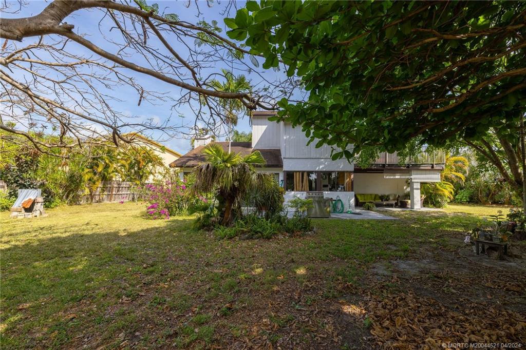 12775 Southwest 110th Terrace Miami, FL 33186 - Photo 32 of 36 a view of a house with a yard