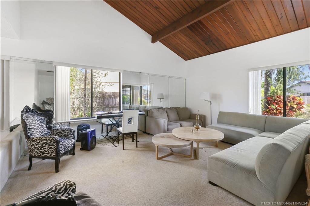 12775 Southwest 110th Terrace Miami, FL 33186 - Photo 4 of 36 a living room with furniture and a large window