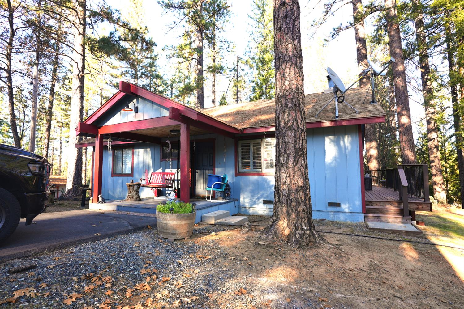 23625 Rock Hammer Road Groveland, CA 95321 - Photo 1 of 40 a front view of a house with porch and seating space