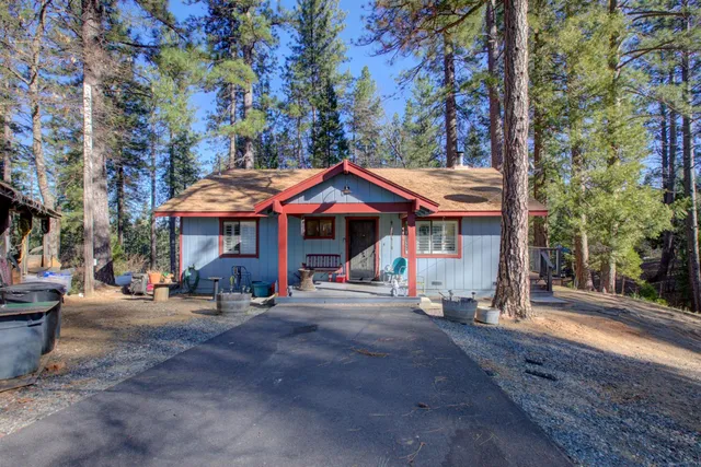 a view of a cafe with sitting area