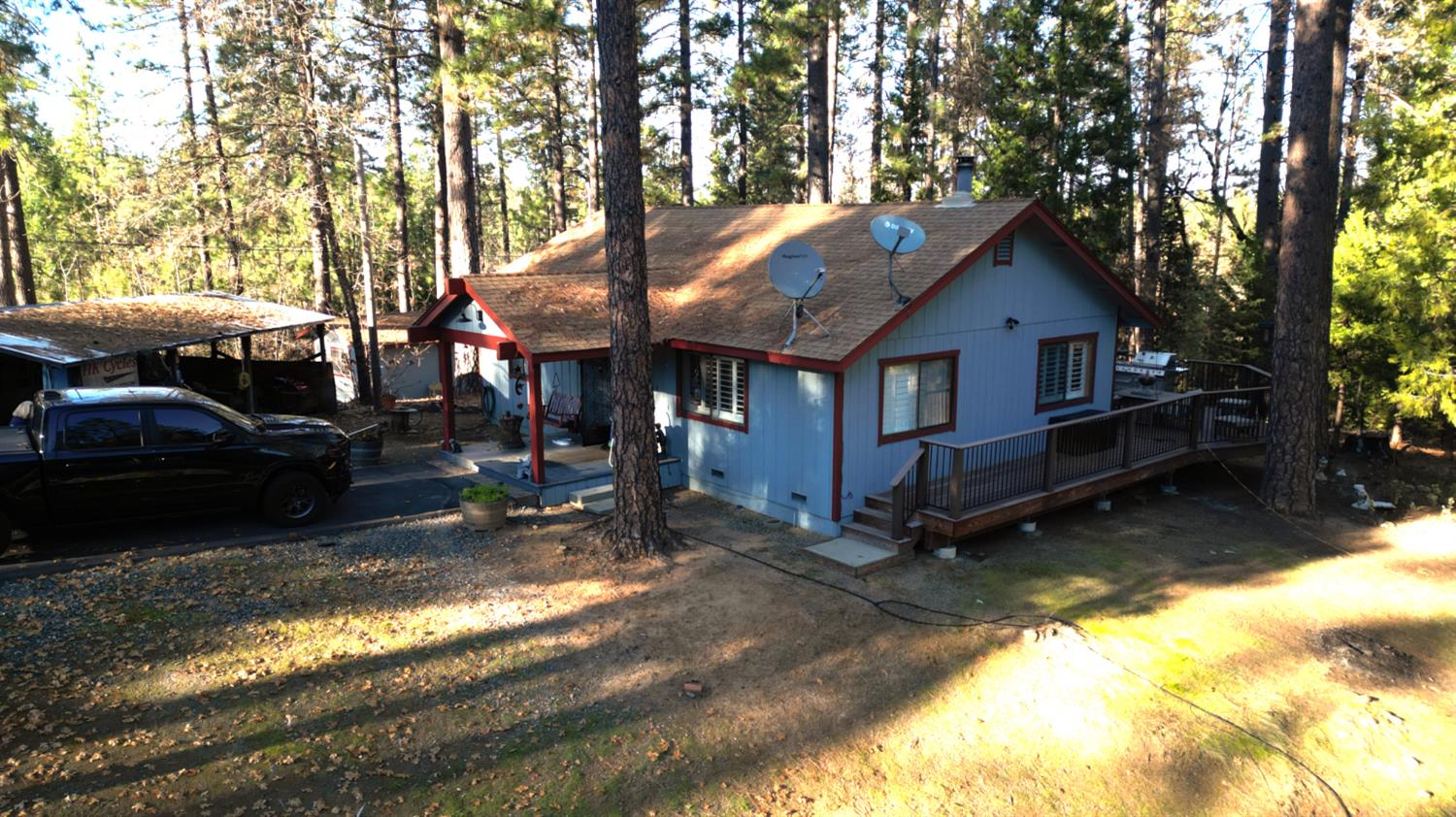23625 Rock Hammer Road Groveland, CA 95321 - Photo 32 of 40 a view of a house with a yard patio and fire pit