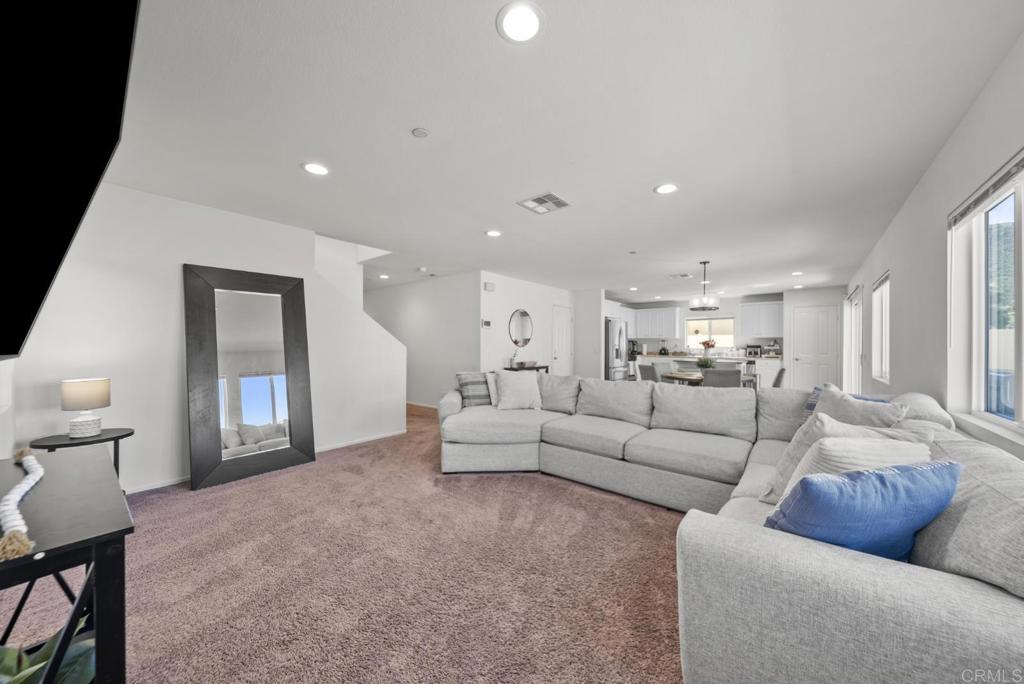29483 Beeler Road Winchester, CA 92596 - Photo 11 of 42 a living room with furniture and a large window