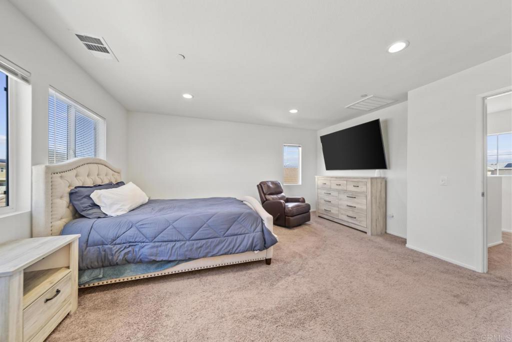 29483 Beeler Road Winchester, CA 92596 - Photo 16 of 42 a living room with furniture and a flat screen tv