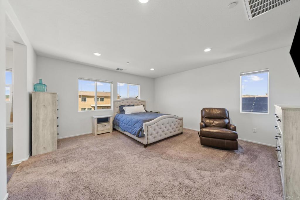 29483 Beeler Road Winchester, CA 92596 - Photo 17 of 42 a bedroom with a bed and a couch