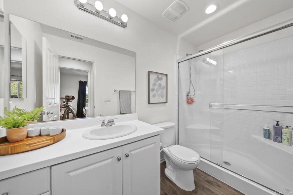 29483 Beeler Road Winchester, CA 92596 - Photo 19 of 42 a bathroom with a sink a toilet and shower