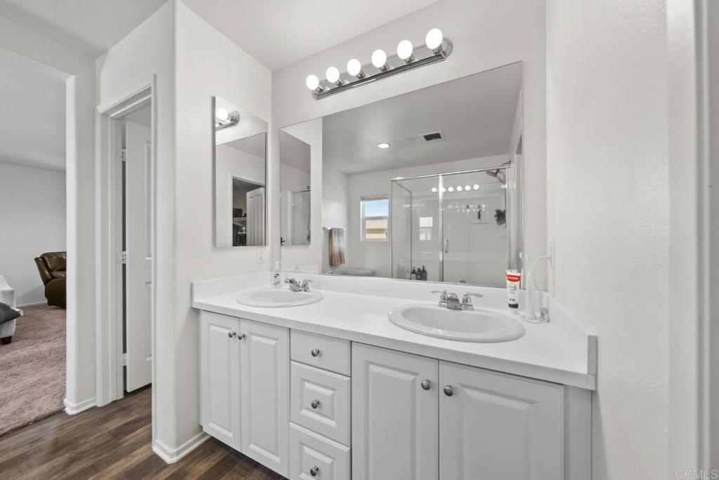 29483 Beeler Road Winchester, CA 92596 - Photo 21 of 42 a bathroom with a sink double vanity and a mirror