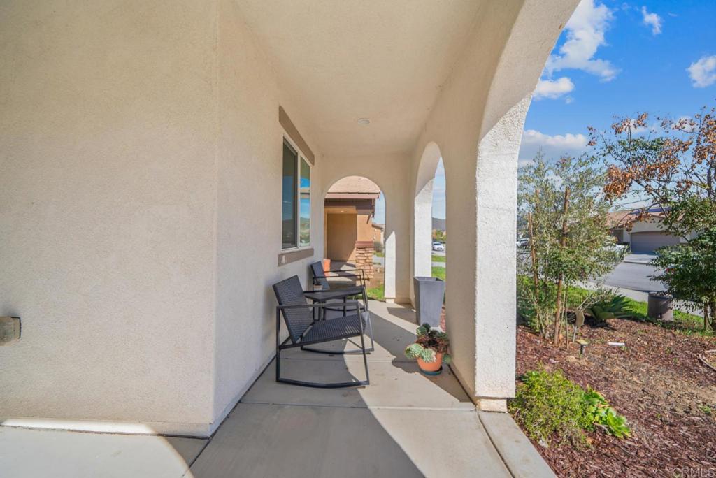 29483 Beeler Road Winchester, CA 92596 - Photo 25 of 42 a view of a balcony with furniture and garden