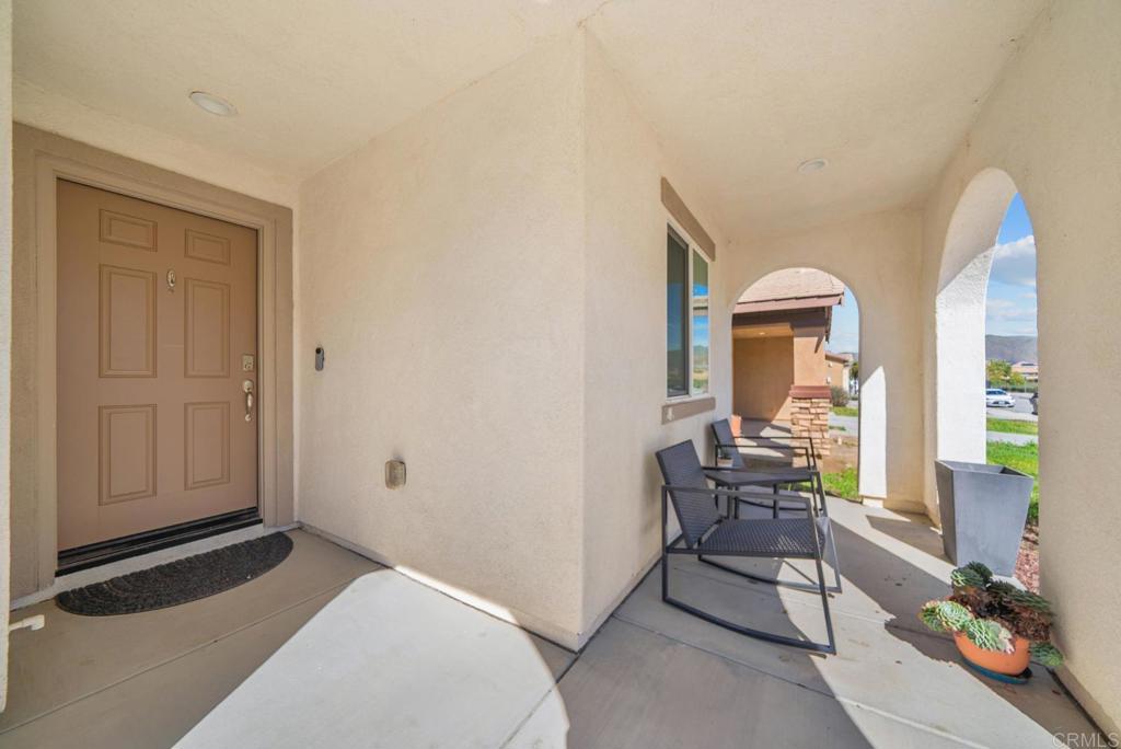 29483 Beeler Road Winchester, CA 92596 - Photo 26 of 42 a bedroom with furniture and a window
