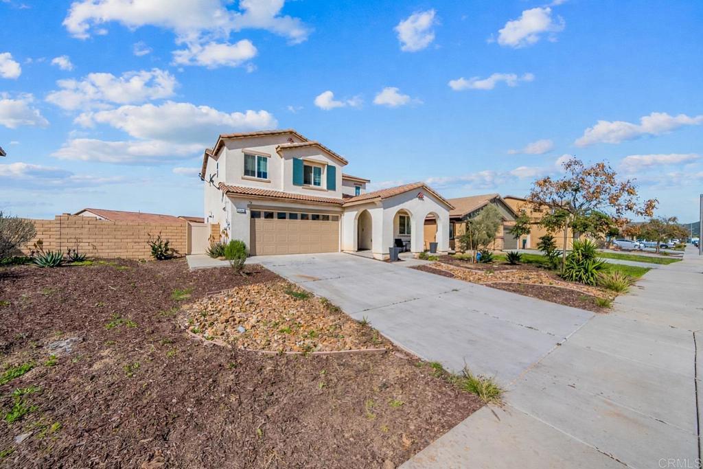 29483 Beeler Road Winchester, CA 92596 - Photo 27 of 42 a front view of a house with a yard