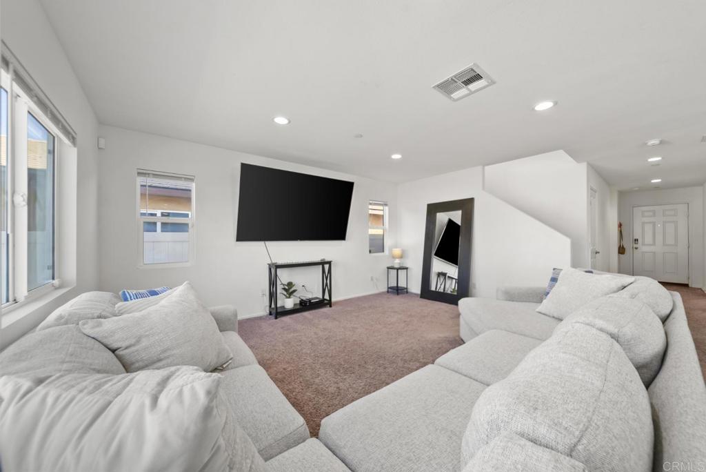 29483 Beeler Road Winchester, CA 92596 - Photo 10 of 42 a living room with furniture and a flat screen tv