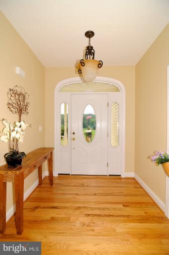 14441 Black Ankle Road Mount Airy, MD 21771 - Photo 13 of 25 a view of a room with wooden floor