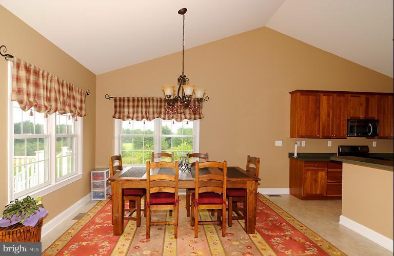 14441 Black Ankle Road Mount Airy, MD 21771 - Photo 6 of 25 a view of a dining room with furniture window and outside view