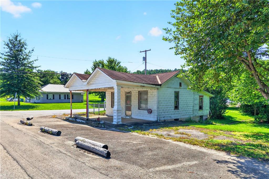 308 Ridge Road Brownsville, PA 15417 - Photo 34 of 49 It's located right on Route 88 and offers off street parking.