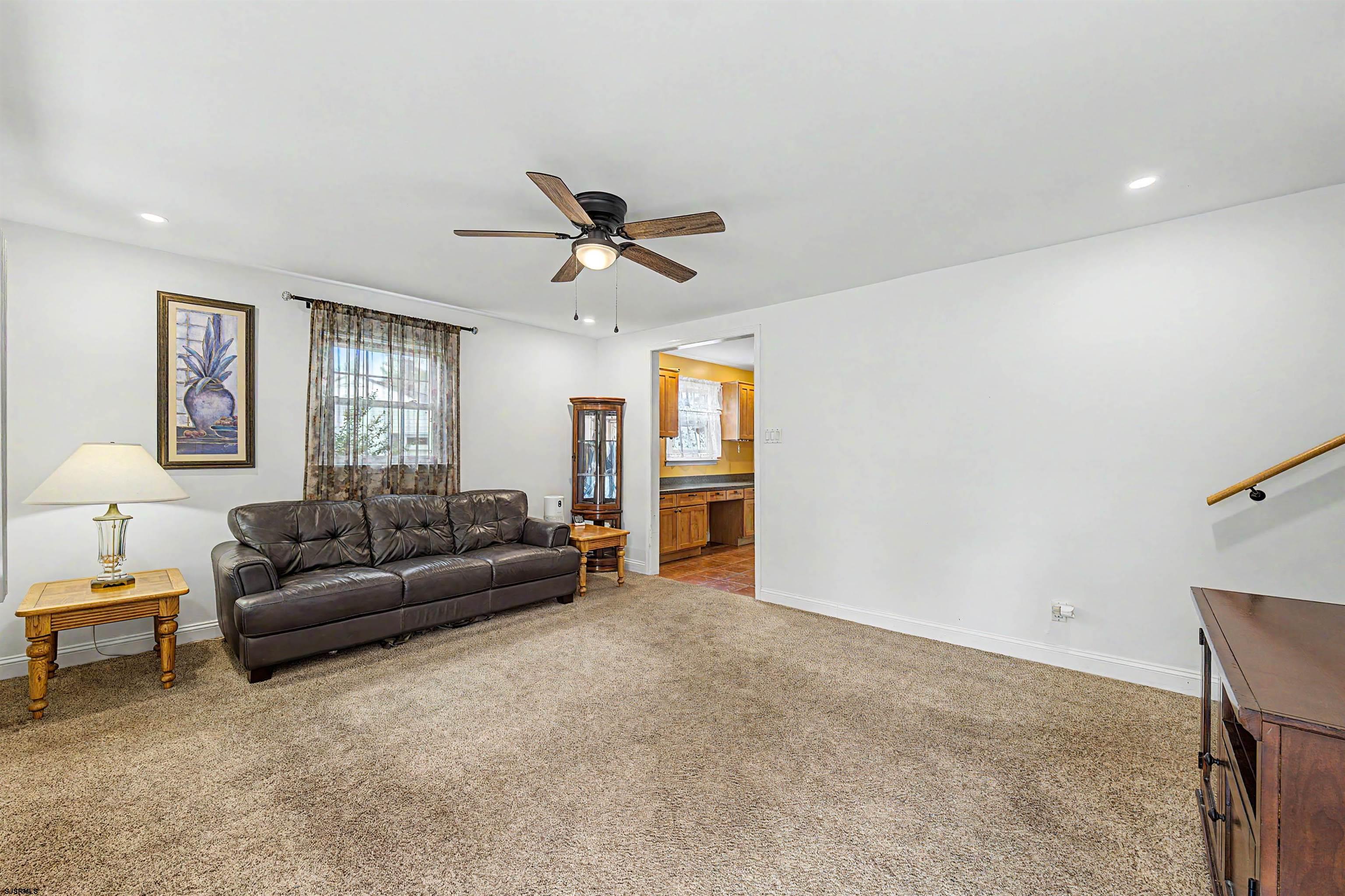 125 Exton Road Somers Point, NJ 08244 - Photo 7 of 35 a living room with furniture and a ceiling fan