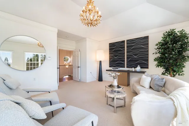 a living room with furniture and window