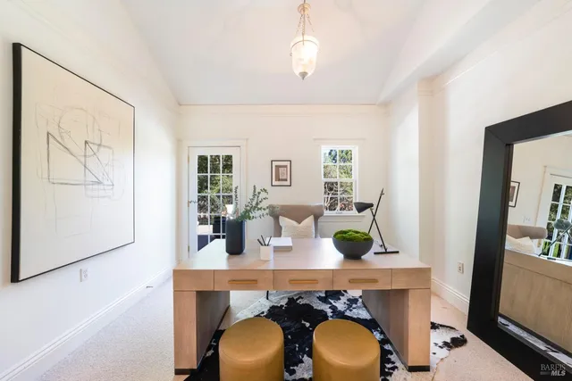 a view of dining room and kitchen with furniture and wooden floor