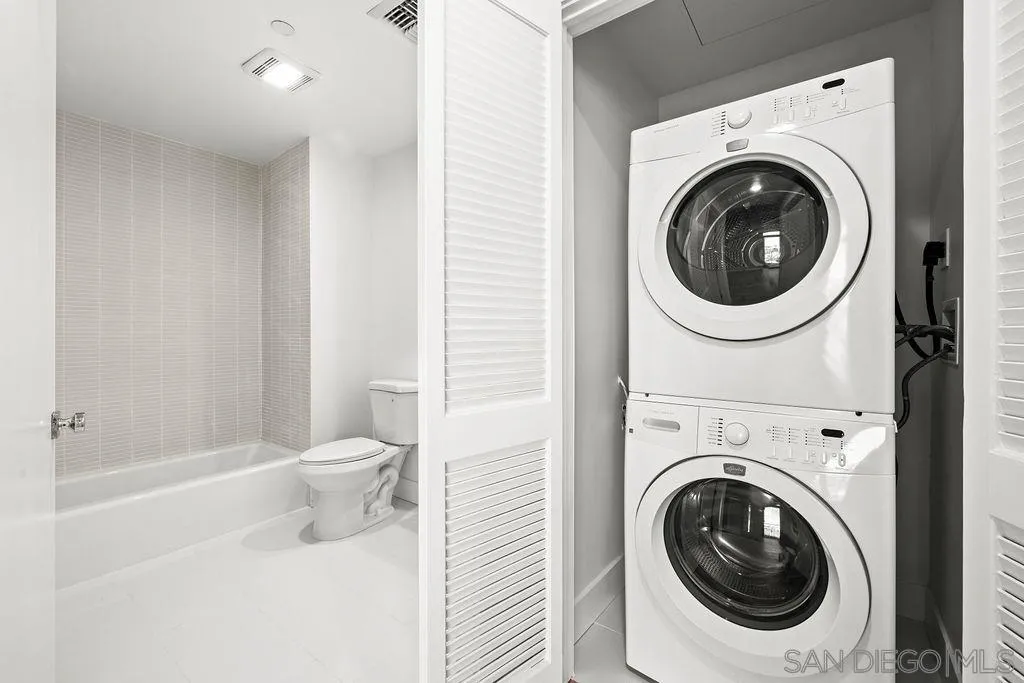 801 Ash Street, Unit 402 San Diego, CA 92101 - Photo 20 of 31 a view of a bathroom with a washer and dryer
