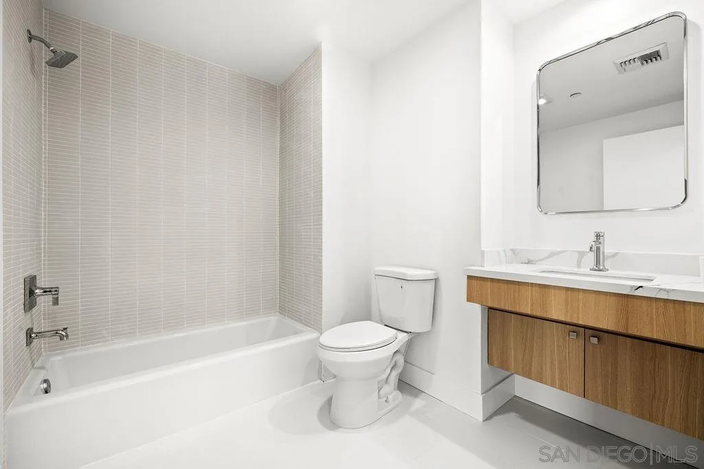 801 Ash Street, Unit 402 San Diego, CA 92101 - Photo 21 of 31 a bathroom with a sink a toilet and a bathtub