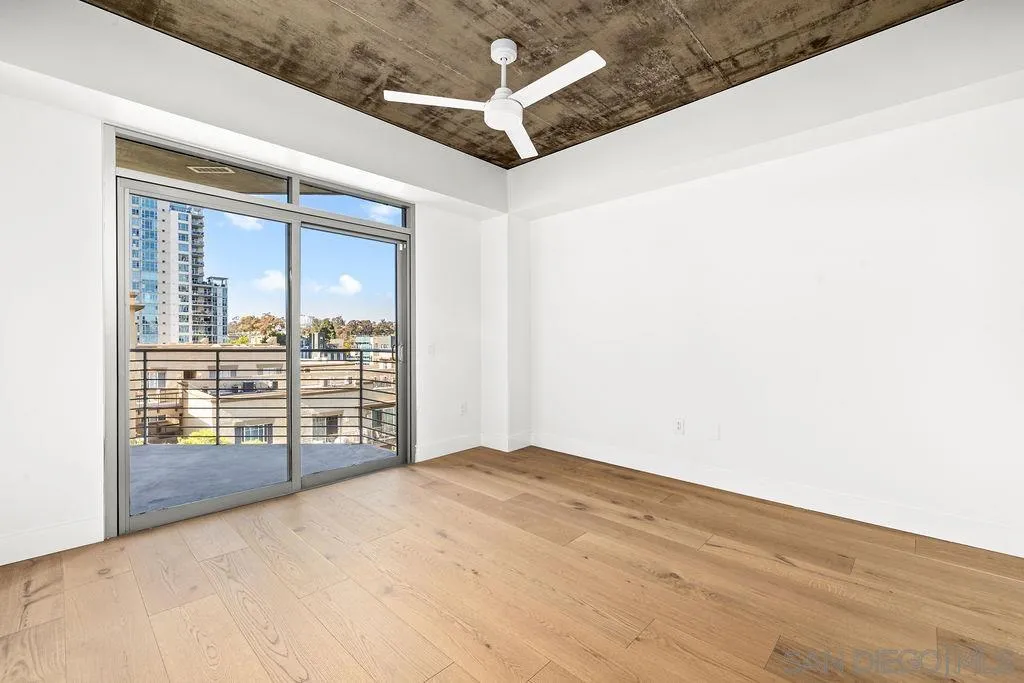 801 Ash Street, Unit 402 San Diego, CA 92101 - Photo 29 of 31 a view of empty room with floor to ceiling window