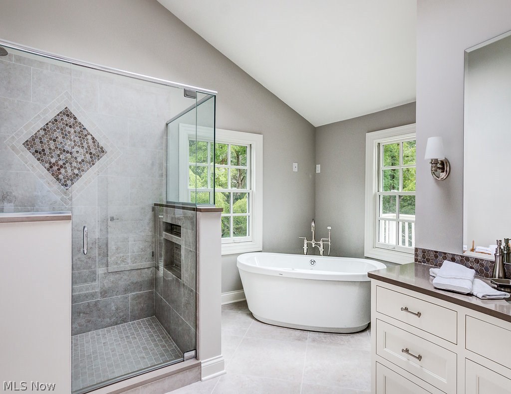 34055 Old Kinsman Road Hunting Valley, OH 44022 - Photo 20 of 32 The free-standing tub accents the corner of the private master bath.