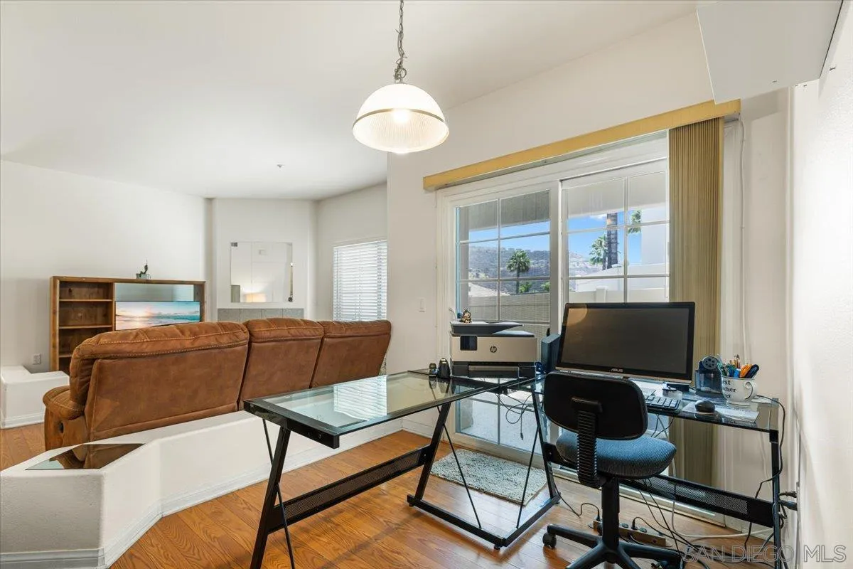 2715 Lake Pointe Drive, Unit 116 Spring Valley, CA 91977 - Photo 17 of 25 a living room with furniture and a window