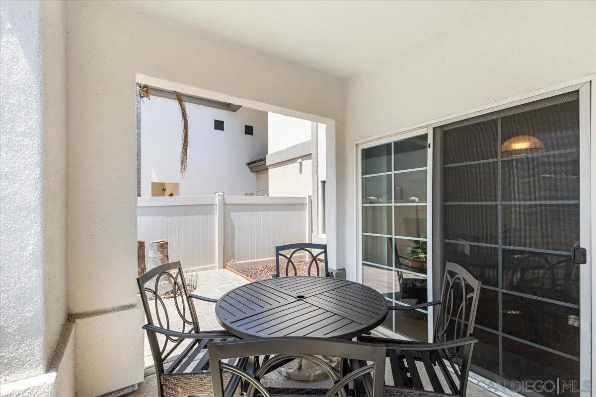 2715 Lake Pointe Drive, Unit 116 Spring Valley, CA 91977 - Photo 24 of 25 a view of a dining room with furniture and window