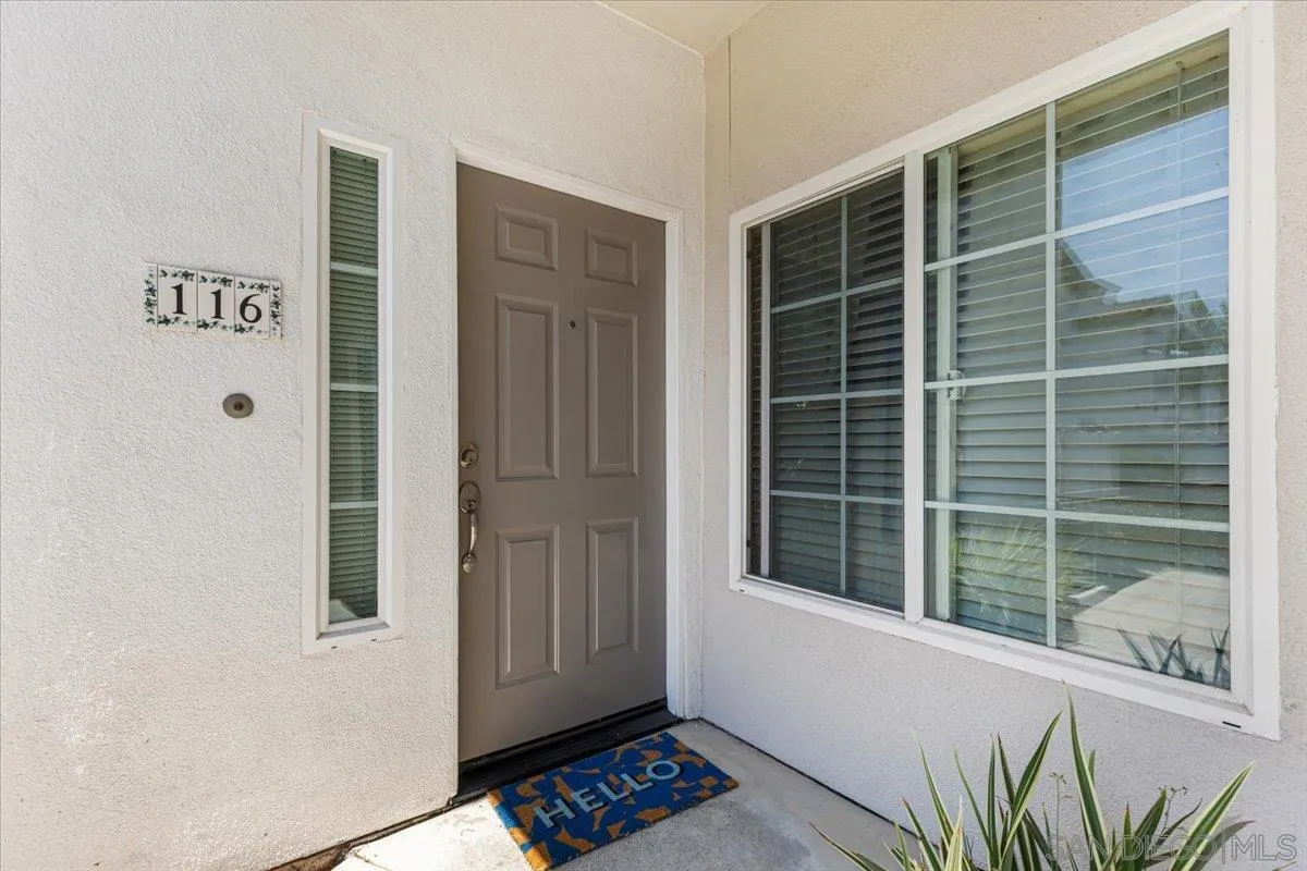 2715 Lake Pointe Drive, Unit 116 Spring Valley, CA 91977 - Photo 3 of 25 a view of a door and a window