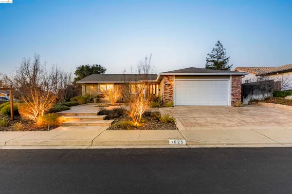 a view of a house with a outdoor space