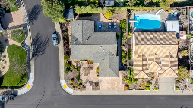 an aerial view of residential house with outdoor space