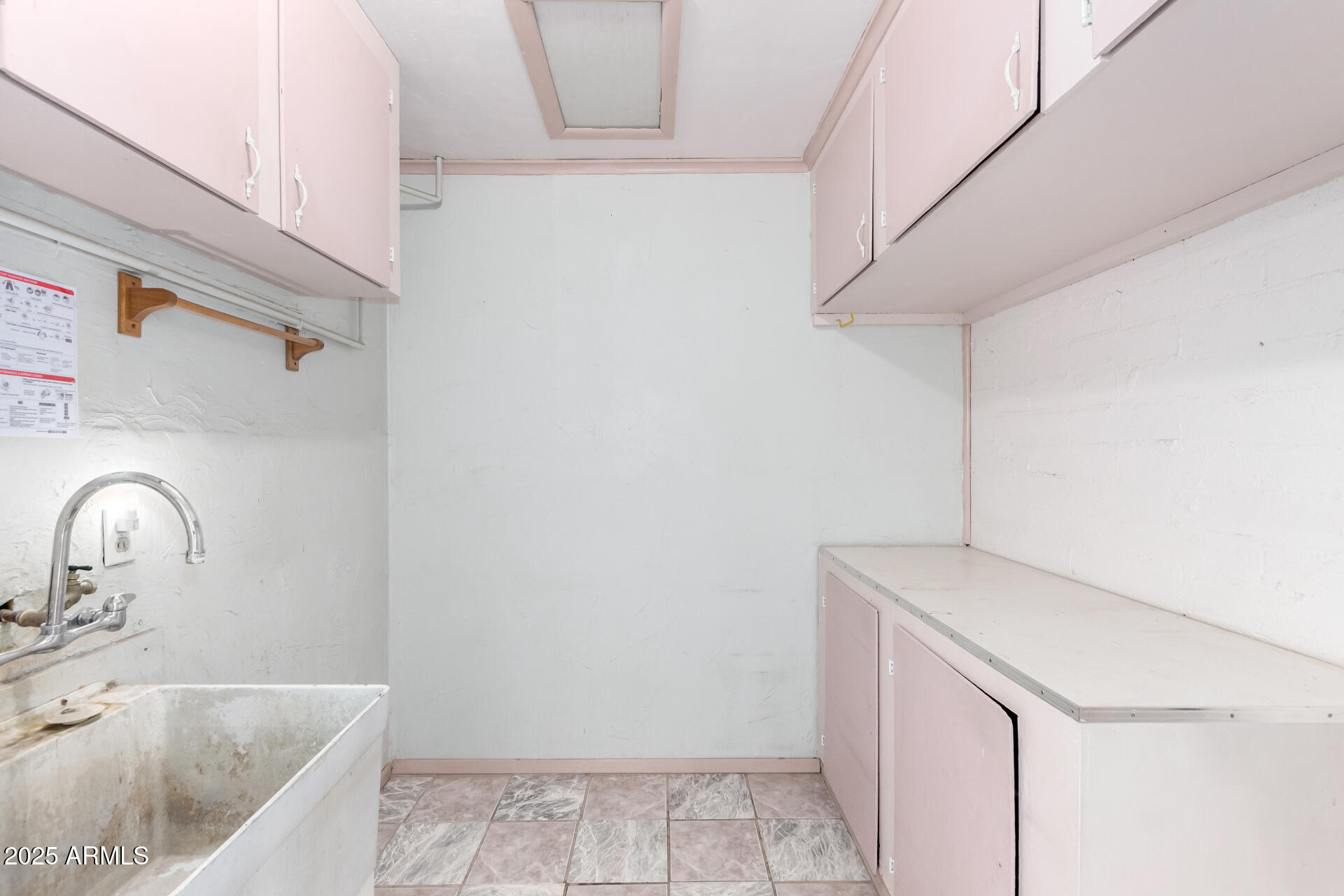 4626 West Mitchell Drive Phoenix, AZ 85031 - Photo 19 of 24 Inside Laundry