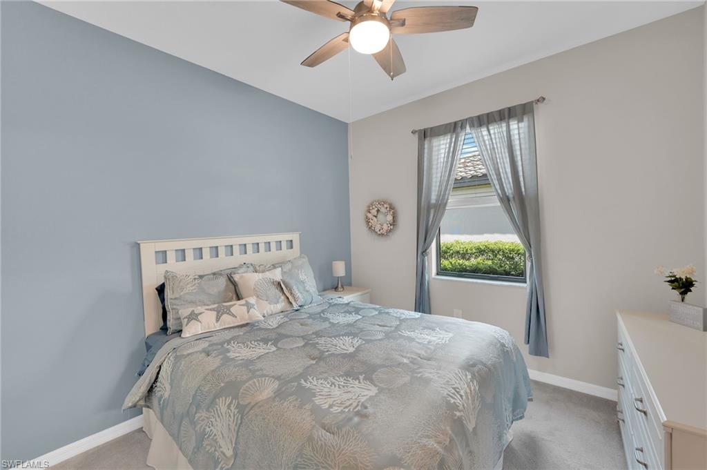 19565 Deming Lane Estero, FL 33928 - Photo 15 of 43 a large white bed in a white room