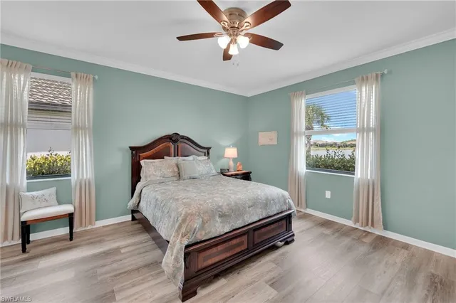 a bedroom with a large bed closet and a window