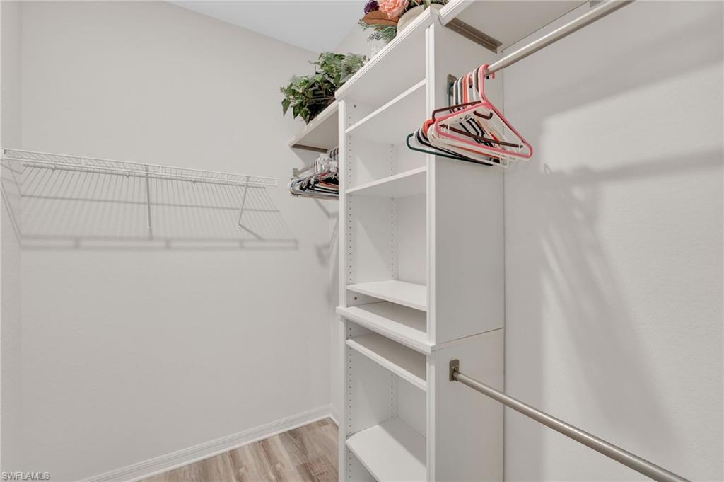 19565 Deming Lane Estero, FL 33928 - Photo 25 of 43 a view of a room with racks on the wall