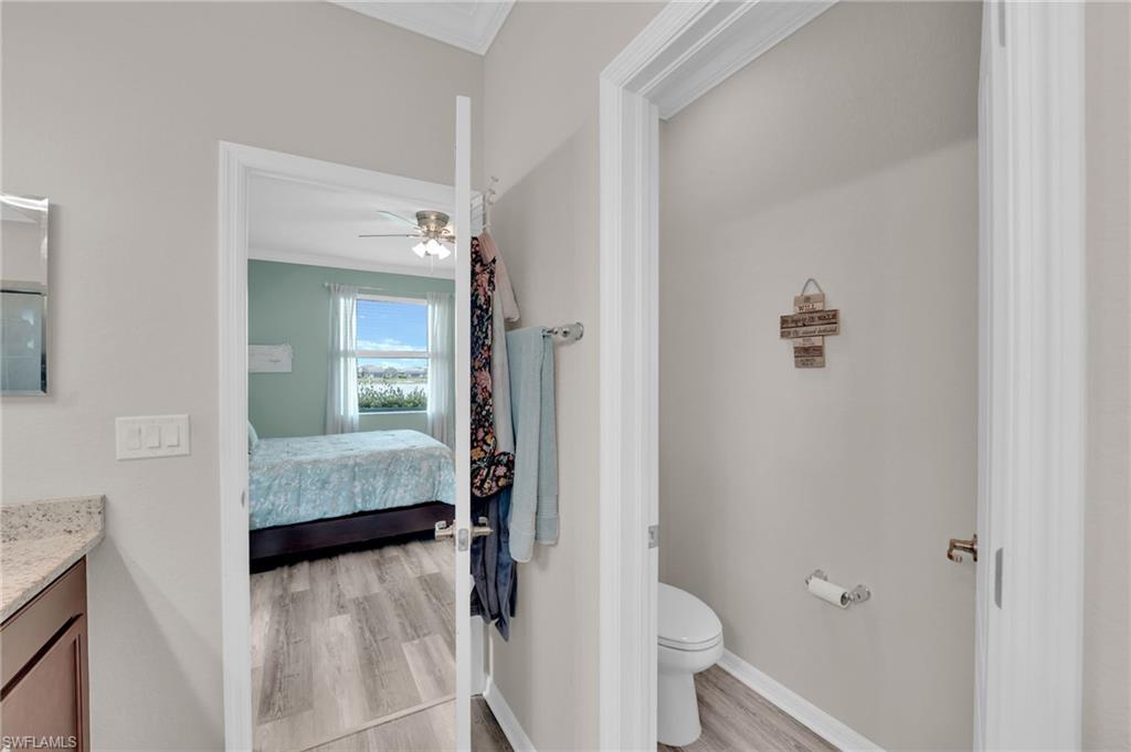 19565 Deming Lane Estero, FL 33928 - Photo 28 of 43 a en suite bathroom with a sink