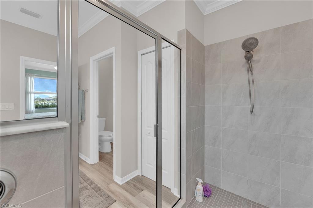 19565 Deming Lane Estero, FL 33928 - Photo 29 of 43 a bathroom with a shower