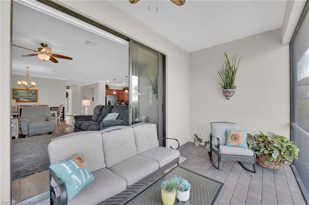 19565 Deming Lane Estero, FL 33928 - Photo 5 of 43 a living room with furniture and wooden floor
