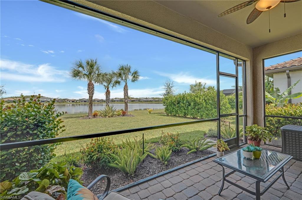 19565 Deming Lane Estero, FL 33928 - Photo 6 of 43 a view of a balcony with lake view and a potted plant