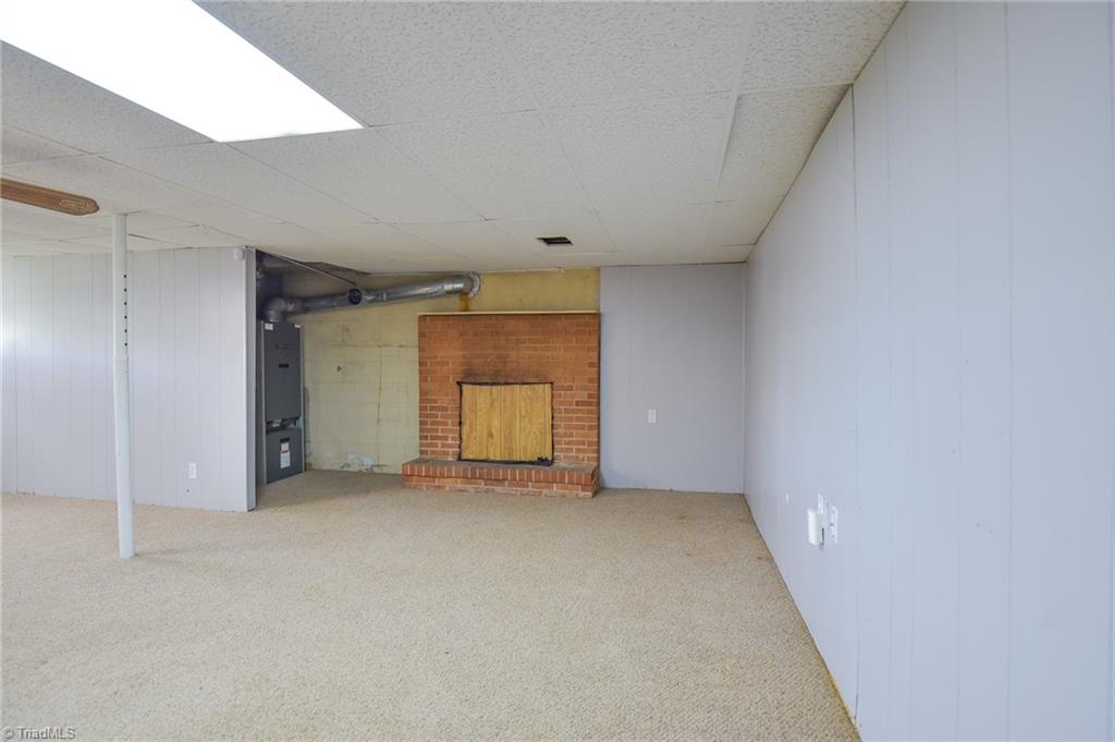 4061 Transou Road Pfafftown, NC 27040 - Photo 17 of 22 Lower level not included in total sq ft. Does have heat & air.
