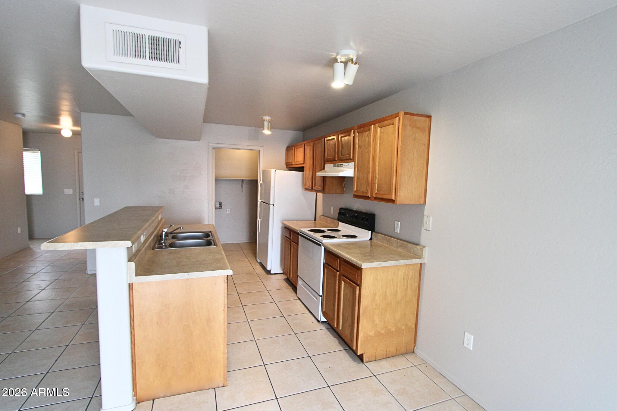 13211 South Kin Circle, Unit A Arizona City, AZ 85123 - Photo 8 of 21