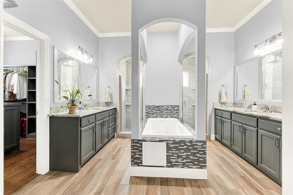 2613 Ranch Court Cedar Hill, TX 75104 - Photo 13 of 29 a large bathroom with a double vanity sink a large mirror and a shower