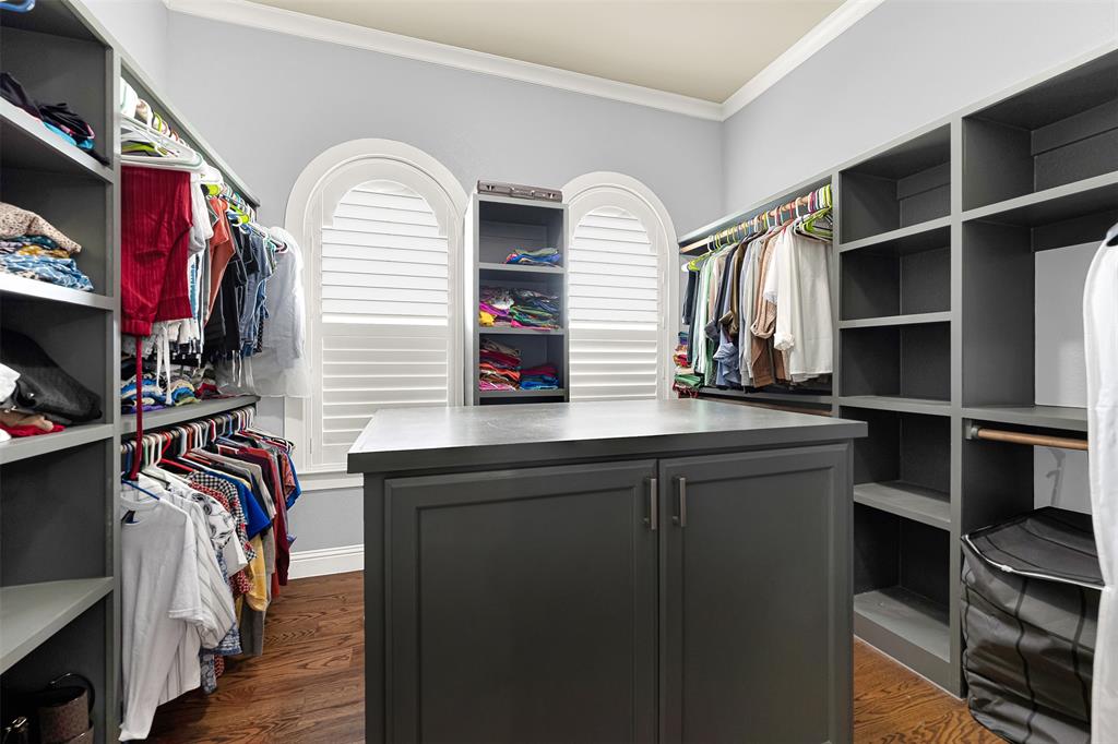 2613 Ranch Court Cedar Hill, TX 75104 - Photo 14 of 29 a view of walk in closet with clothes and shoes
