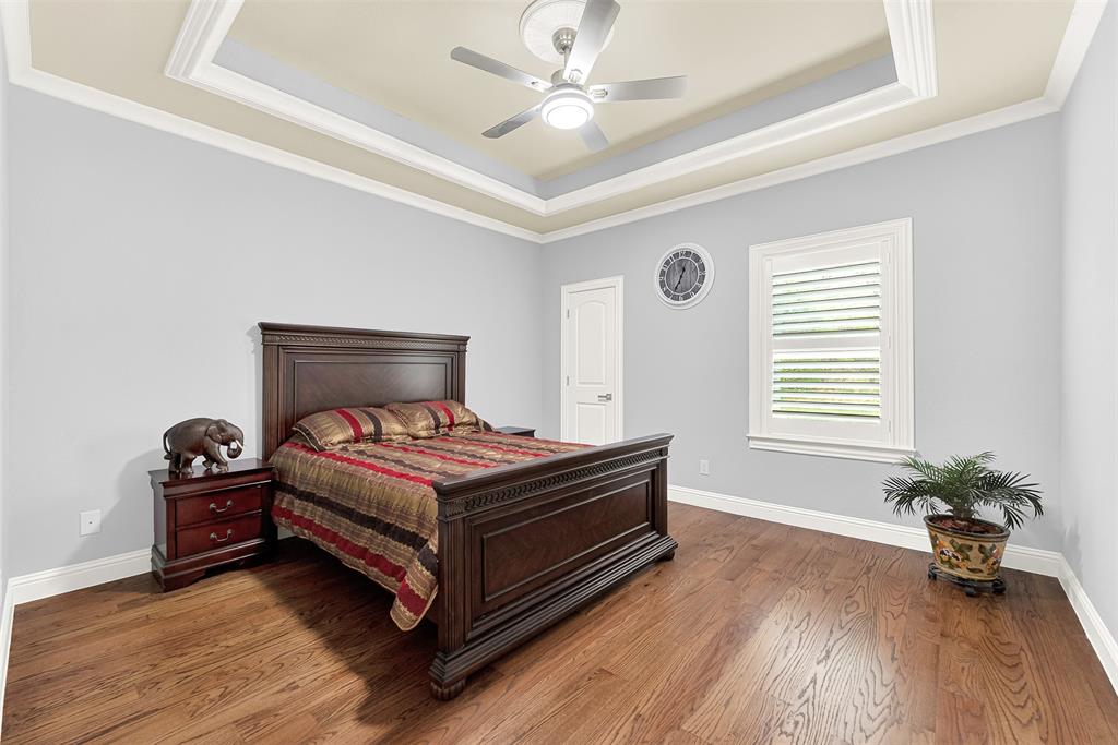 2613 Ranch Court Cedar Hill, TX 75104 - Photo 17 of 29 a living room with a bed furniture and a window