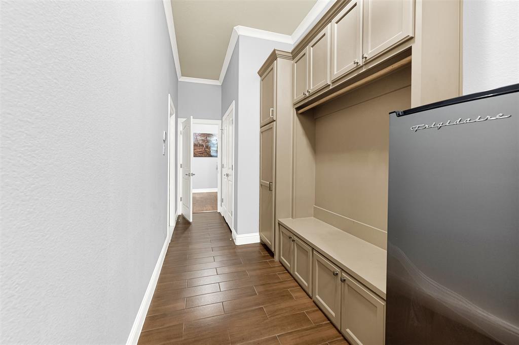2613 Ranch Court Cedar Hill, TX 75104 - Photo 21 of 29 a view of a hallway with wooden floor and staircase