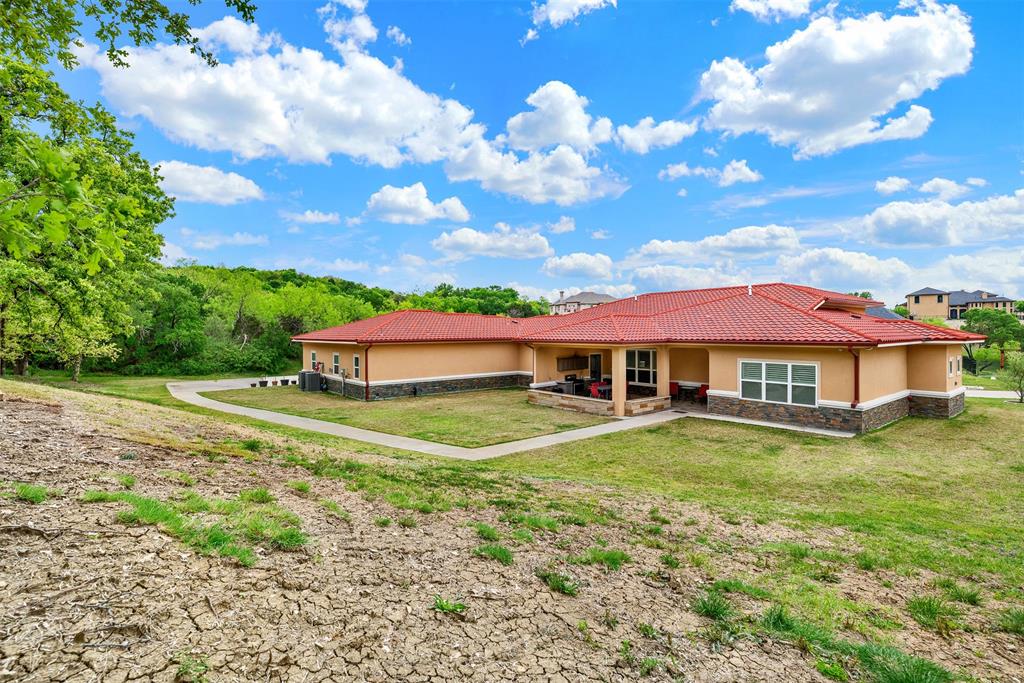 2613 Ranch Court Cedar Hill, TX 75104 - Photo 24 of 29 a view of a house with a yard