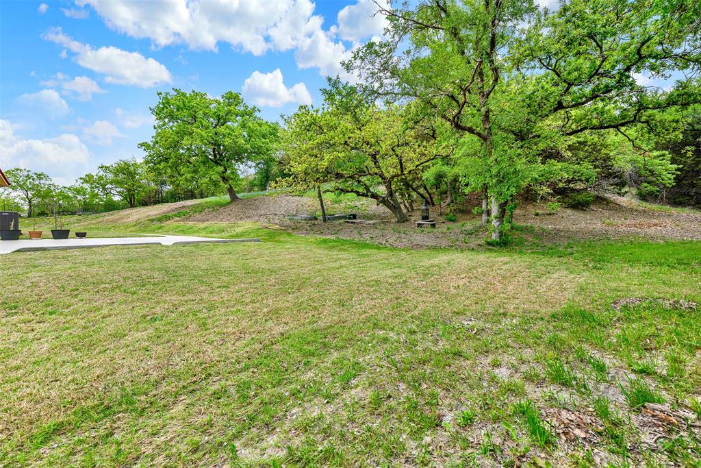 2613 Ranch Court Cedar Hill, TX 75104 - Photo 28 of 29 a view of yard with green space