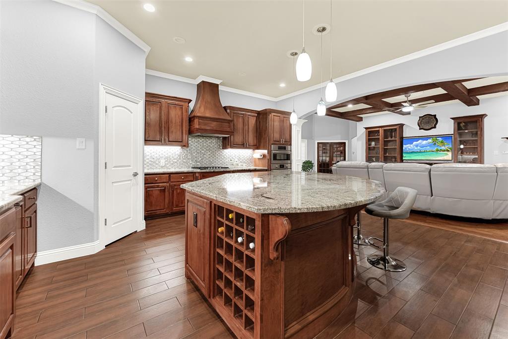 2613 Ranch Court Cedar Hill, TX 75104 - Photo 9 of 29 a kitchen with stainless steel appliances granite countertop a stove and a refrigerator