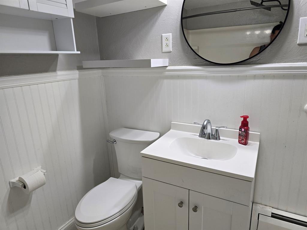 1008 Manor Road New Kensington, PA 15068 - Photo 36 of 39 a bathroom with a sink mirror and toilet