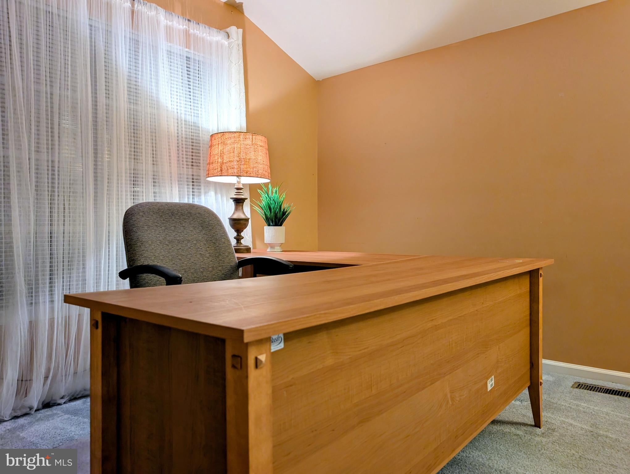 21 Miller Circle Pennington, NJ 08534 - Photo 12 of 14 a room with a table and a chair