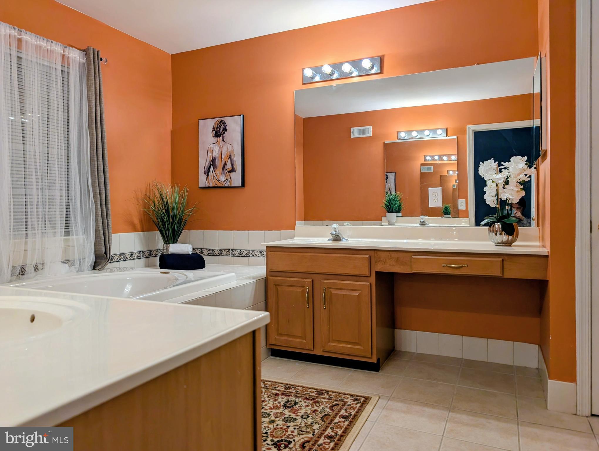 21 Miller Circle Pennington, NJ 08534 - Photo 7 of 14 a bathroom with a sink and a mirror