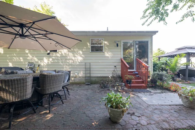 a view of a pathway of a house front of a house